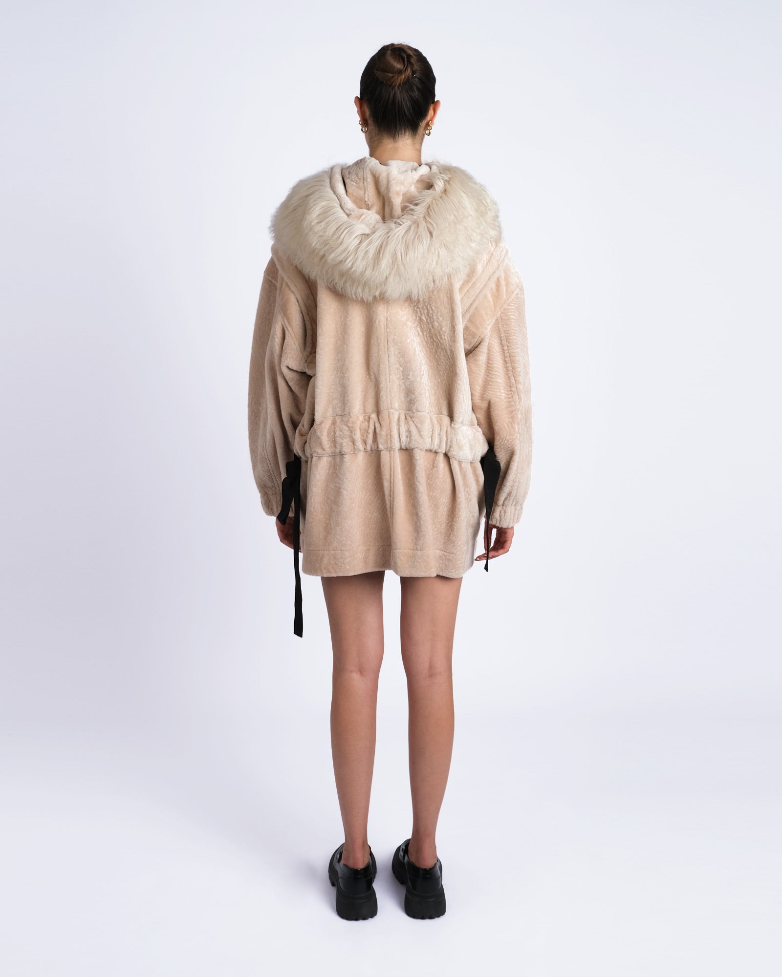 Parka in shearling con cappuccio